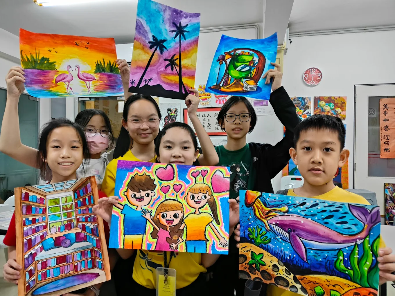 CYW Art & Craft students proudly showing their paintings