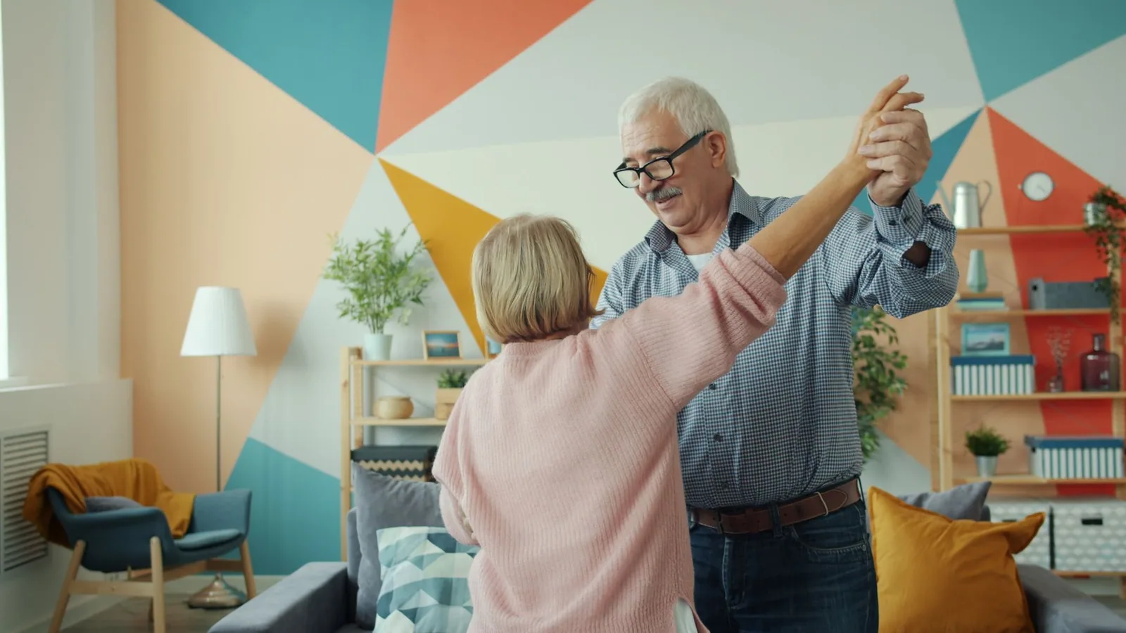 A couple dancing at home