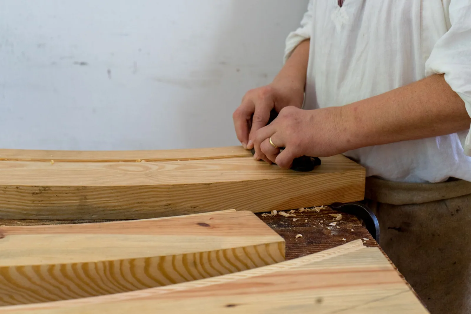 A joiner working timber for a staircase