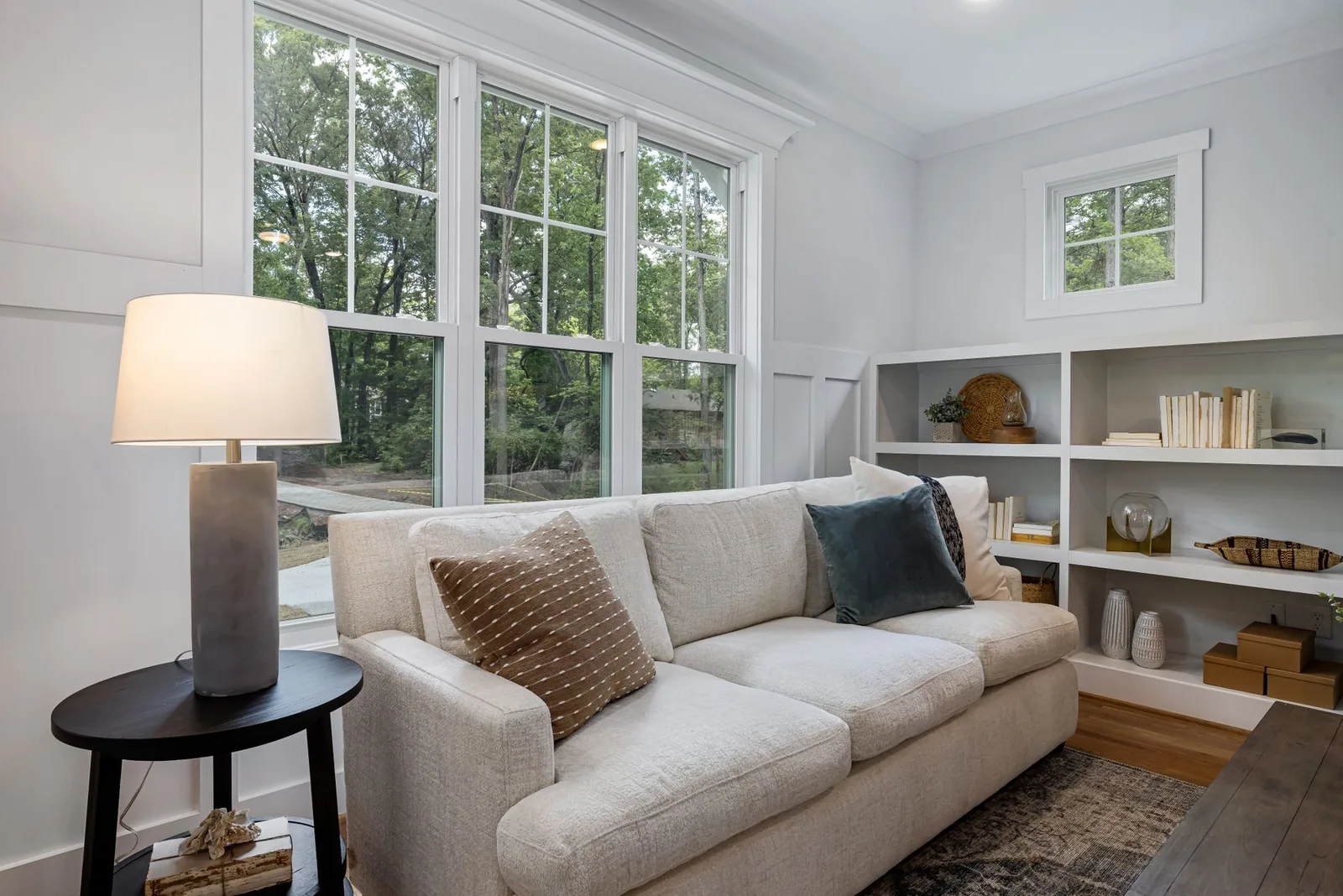 A living room with large windows