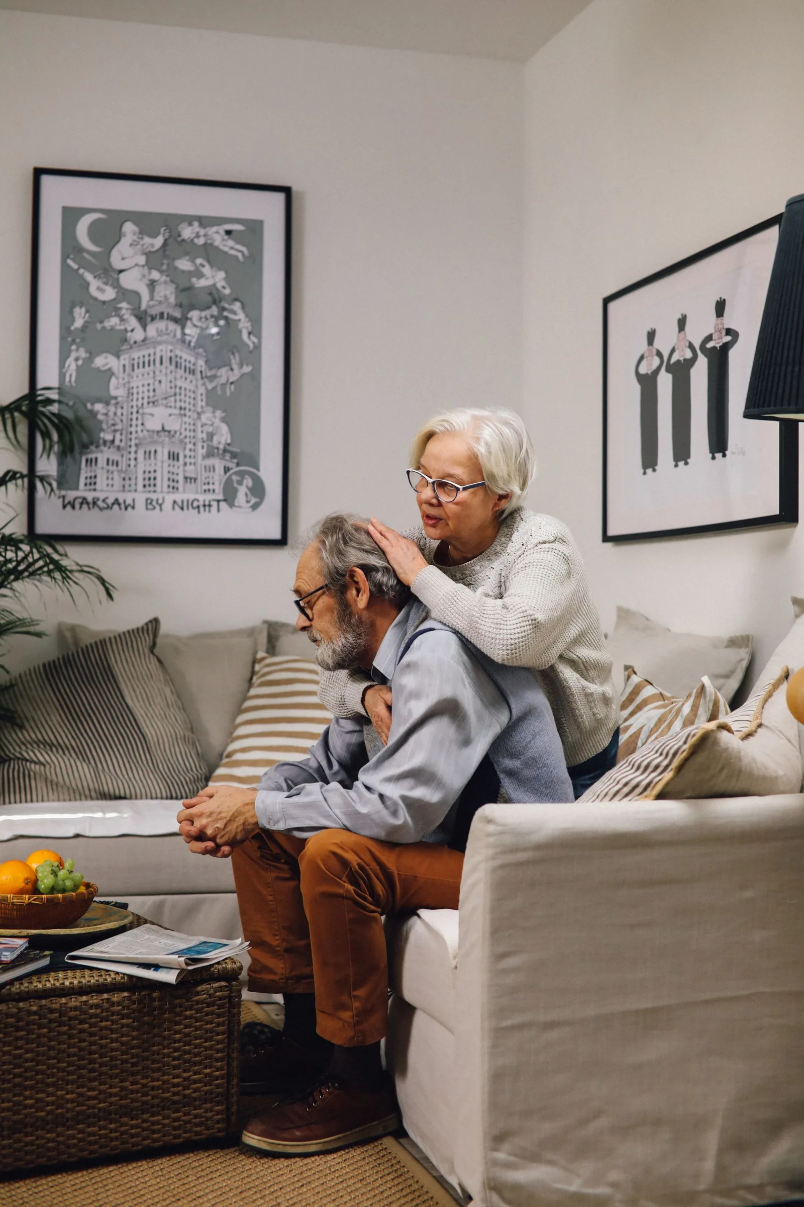 A couple at home on the sofa