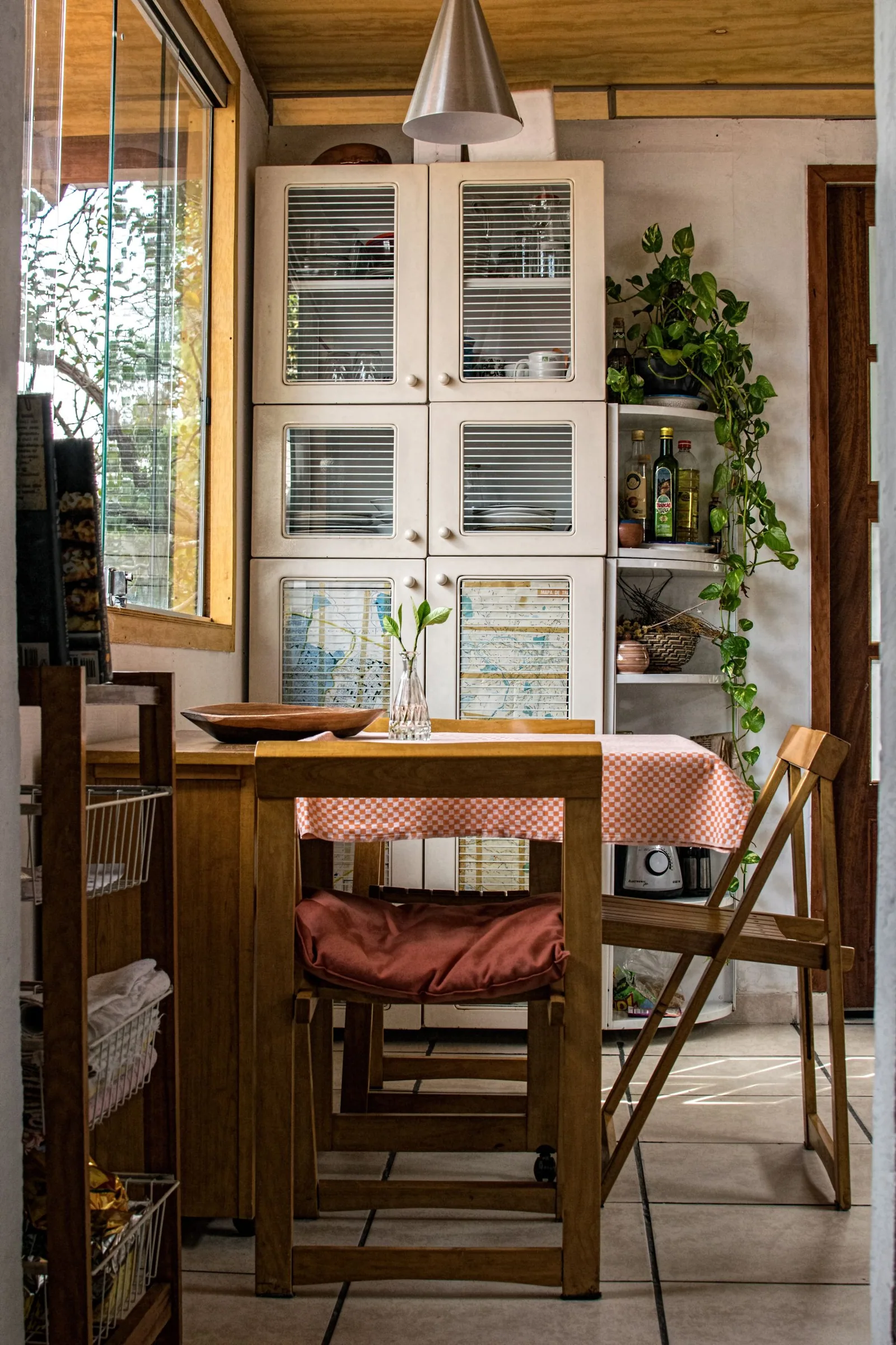 A warm interior with timber and plants