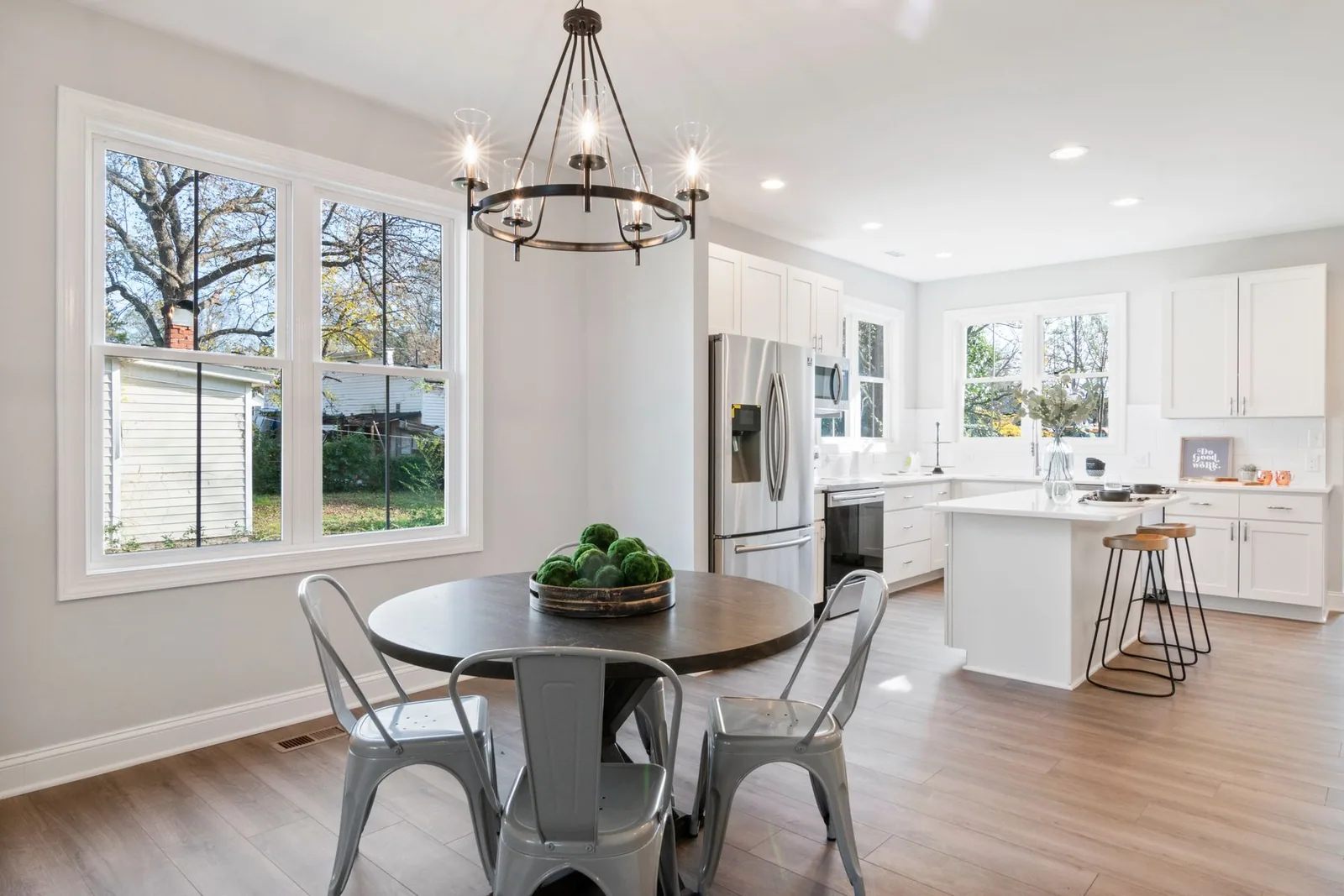 A dining area beside a kitchen