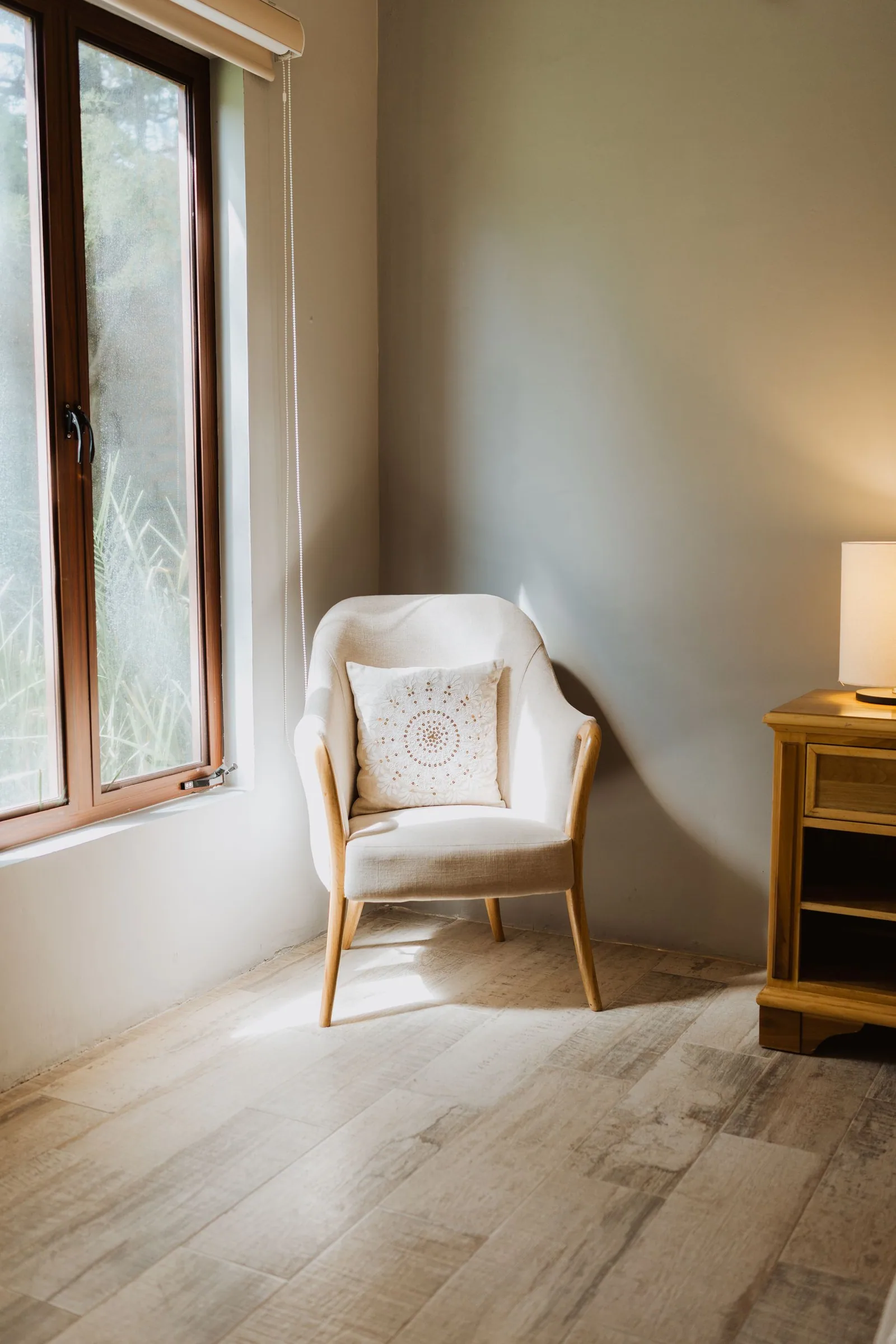An armchair by a window
