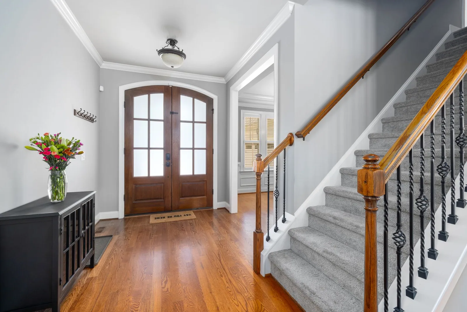 A hallway and staircase in a private home