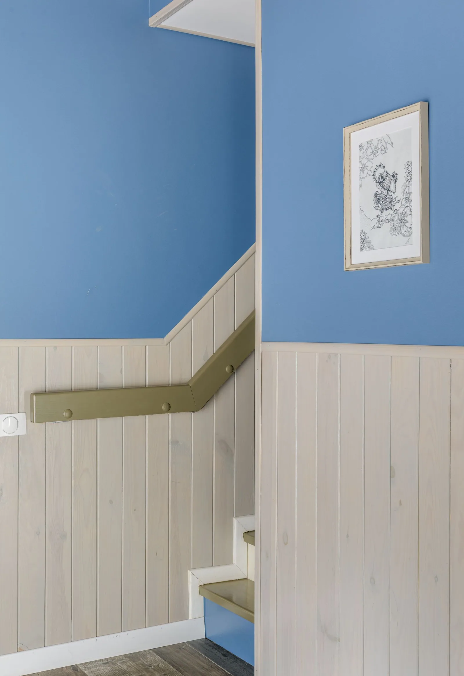 Panelling beside a staircase