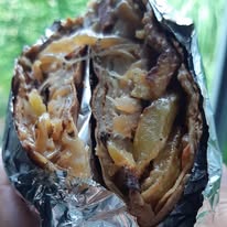 Fries wrapped in foil, ready to take away