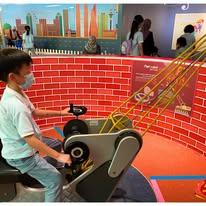 A pupil at an indoor creative play station